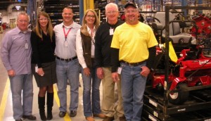 Brian and Gene Coe (at right) stand with Brian's new Lazer Z, which is ready to ship off to him in TN. The Coes are standing with Exmark General Manager, Judy Altmaier; Director of Marketing, Daryn Walters; Associate Marketing Manager, Katie Tauer and Marketing Manager, John Cloutier.